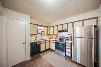 Apartment kitchen with stainless steel appliances